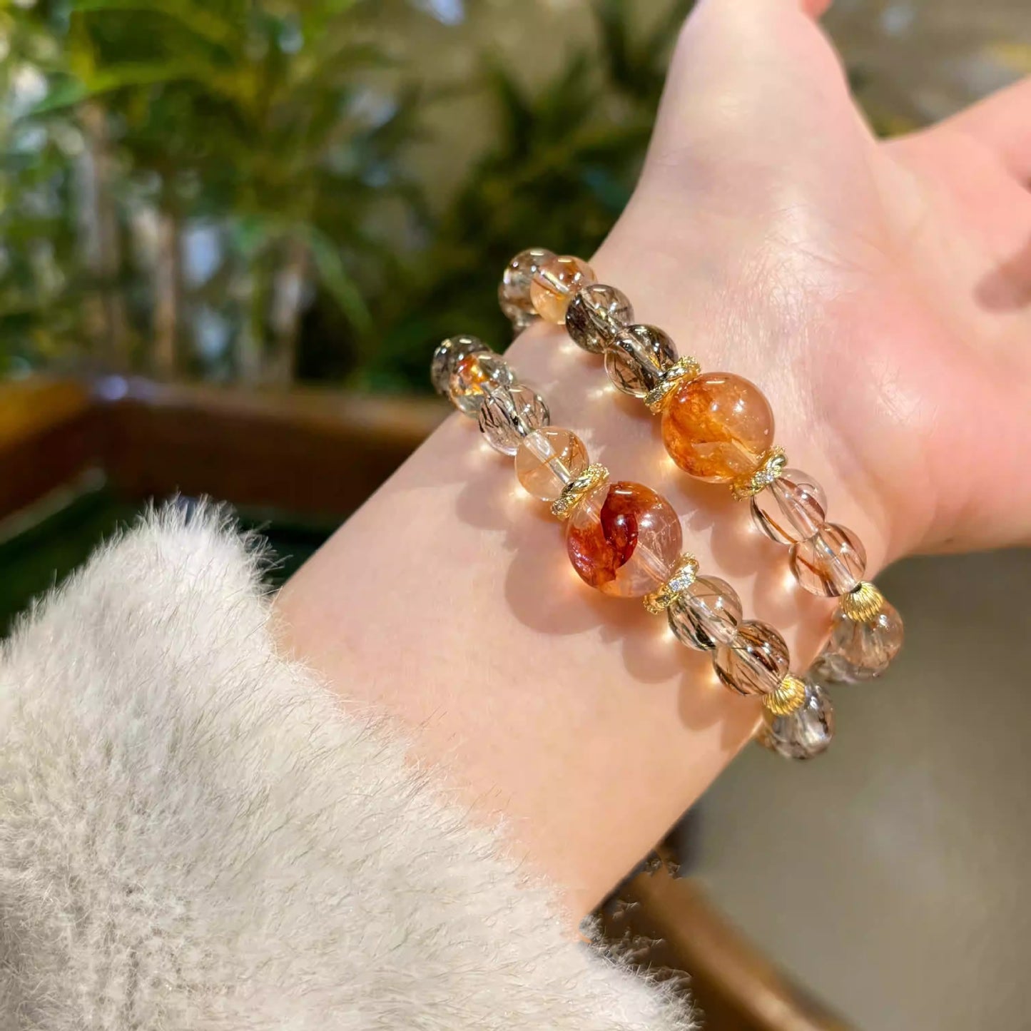 Natural black gold super seven red glue flower bracelet, gold-wrapped crystal bracelet, women's niche design jewelry.