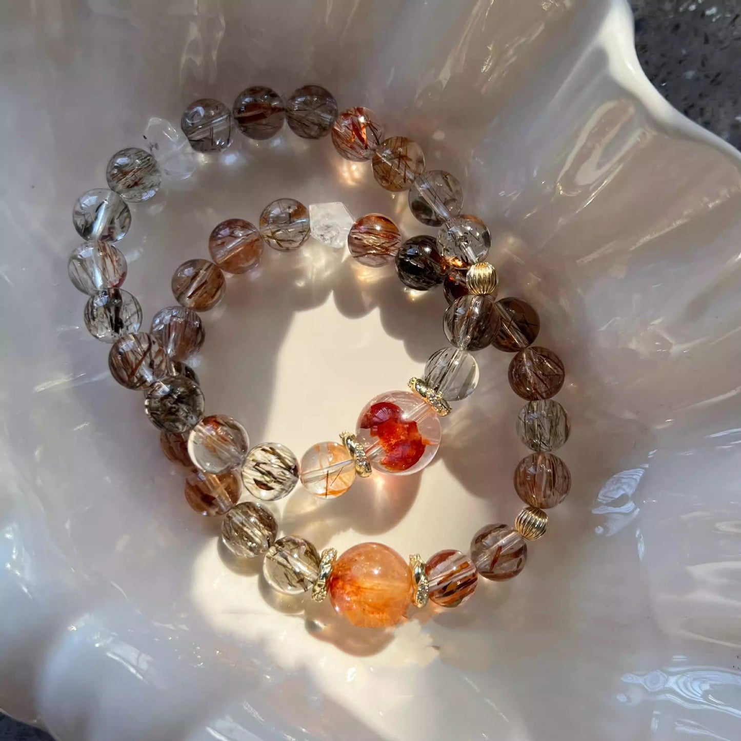 Natural black gold super seven red glue flower bracelet, gold-wrapped crystal bracelet, women's niche design jewelry.