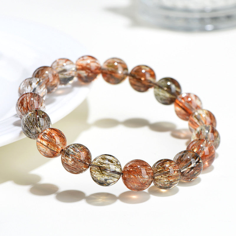 Natural crystal 7A grade smooth hair black gold super seven round bead bracelet, black gold bracelet.