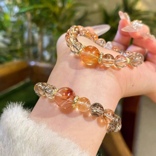 Natural black gold super seven red glue flower bracelet, gold-wrapped crystal bracelet, women's niche design jewelry.