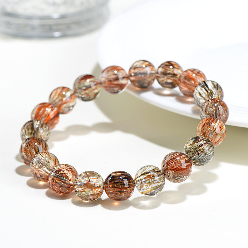 Natural crystal 7A grade smooth hair black gold super seven round bead bracelet, black gold bracelet.