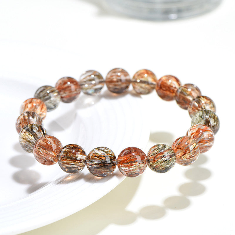 Natural crystal 7A grade smooth hair black gold super seven round bead bracelet, black gold bracelet.